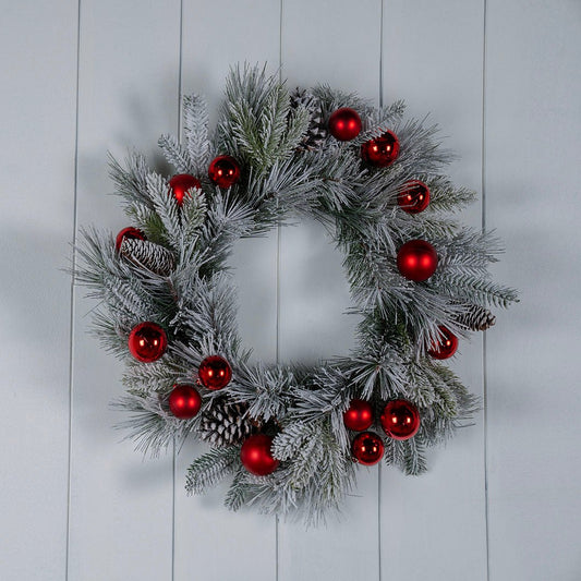 Flocked 24" Festive Foliage Wreath with Red Ornaments & Pinecones - Joy By