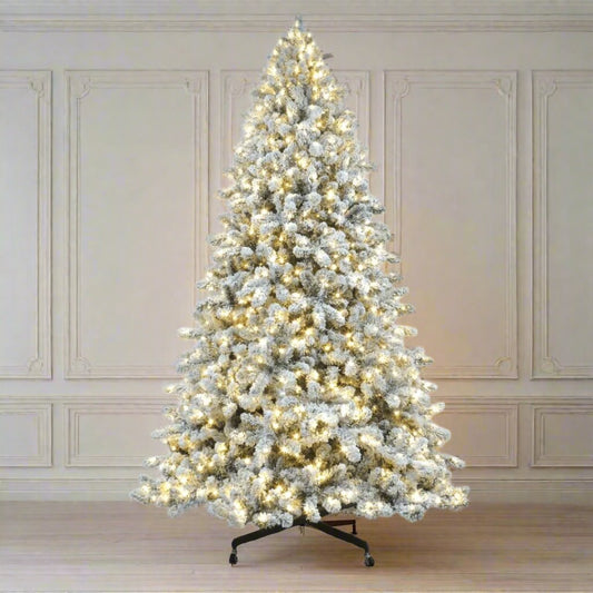 Joy By 8.5' Flocked Christmas tree with 900 Warm White LED Lights - Joy By